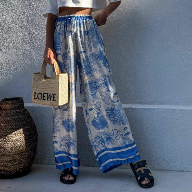 Wide palazzo pants for Damen with floral pattern and elastic waistband Chic and Style