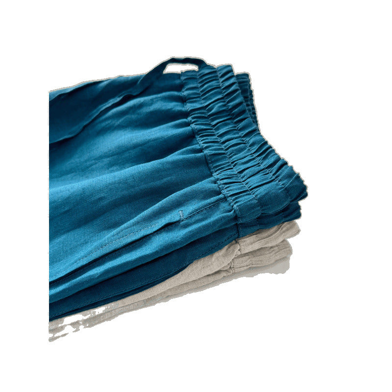 Casual linen pants for women with elastic waist and side pockets with openings.