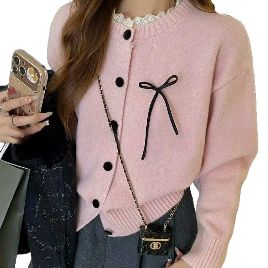 Dames confortable cardigan avec des boutons décoratifs et des accents de nœuds Chic und Stil