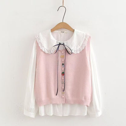 Blouse en tricot pour femmes avec col décoratif et appliqués faits main Chic und Stil