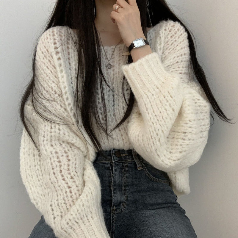 Pull en tricot décontracté pour femmes avec des manches bouffantes volumineuses et une structure en tricot ouverte Chic und Stil