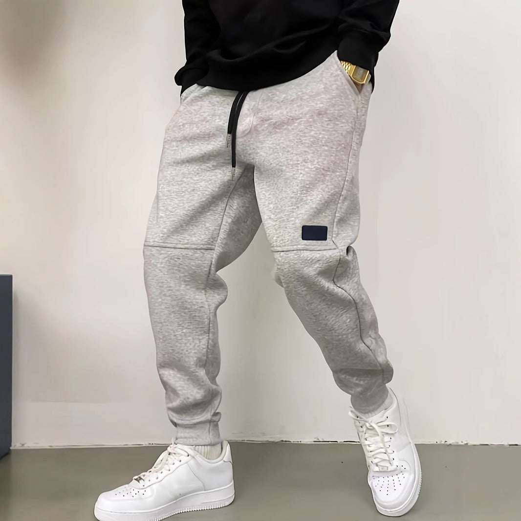 Pantalon de jogging décontracté pour hommes avec taille élastique et poches latérales Chic und Stil