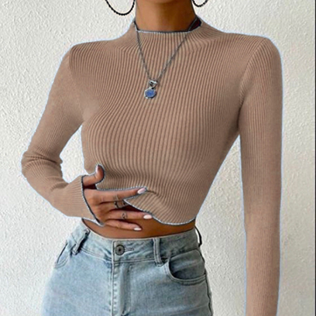 Pull en fine maille pour femmes avec col montant à la mode et design sans vagues Chic und Stil