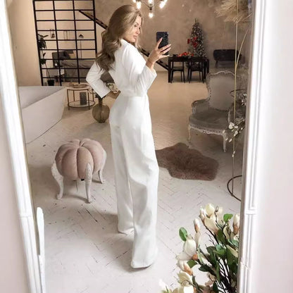 Dames élégant combinaison avec jambe évasée et décolleté en V profond Chic und Stil