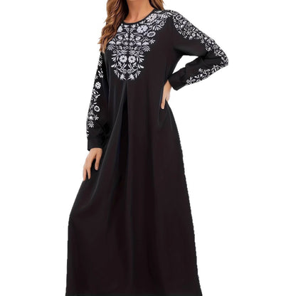 Robe maxi femme avec broderie artistique et élégants manches longues Chic und Stil