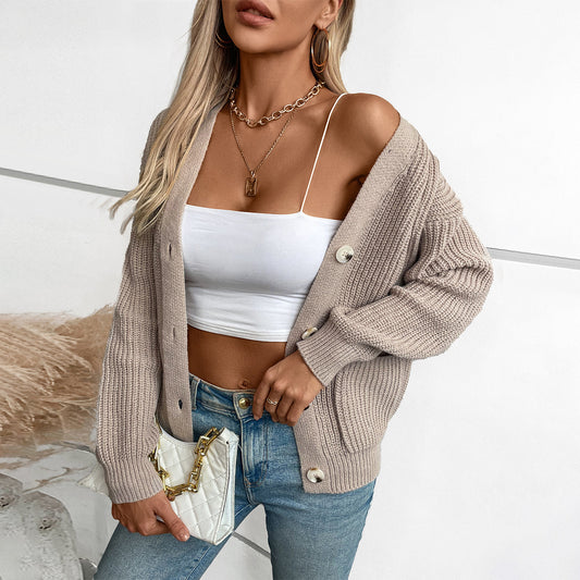 Veste en tricot pour femmes avec décolleté en V profond et poches pratiques Chic und Stil