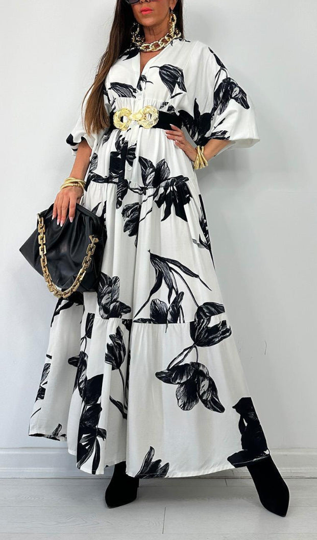 Robe maxi pour femme avec un design de bouton raffiné et un imprimé floral Chic und Stil