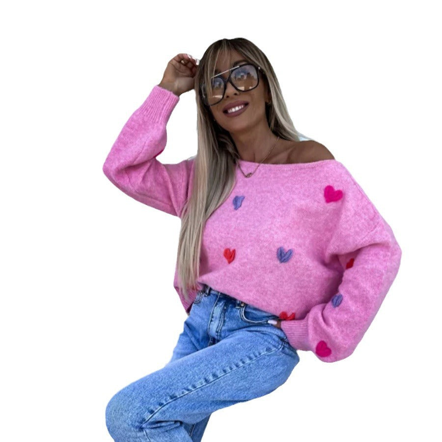 Pull femme avec des cœurs ludiques et une coupe décontractée Chic und Stil