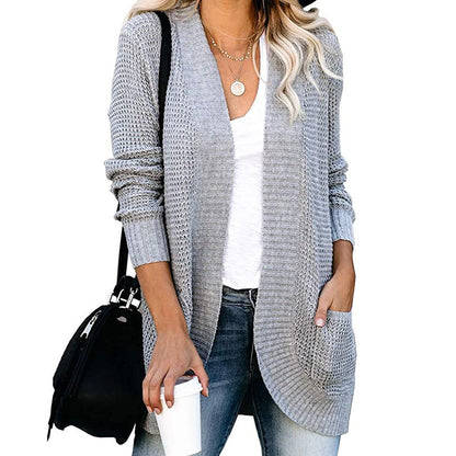 Veste en tricot pour femmes avec un motif de tricot moderne et des poches pratiques Chic und Stil