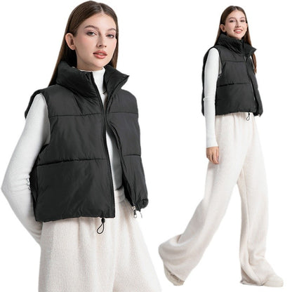 Dames doudoune sans manches avec col montant et cordon taille ajustable Chic und Stil