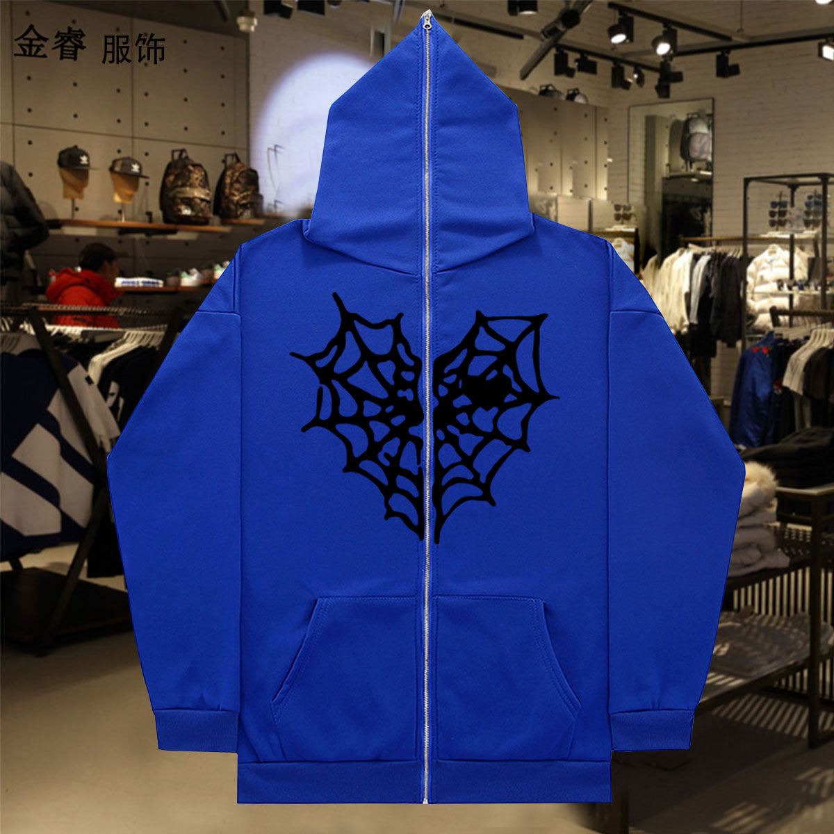 Dame Hoodie avec un design de toile d'araignée saisissant Chic und Stil