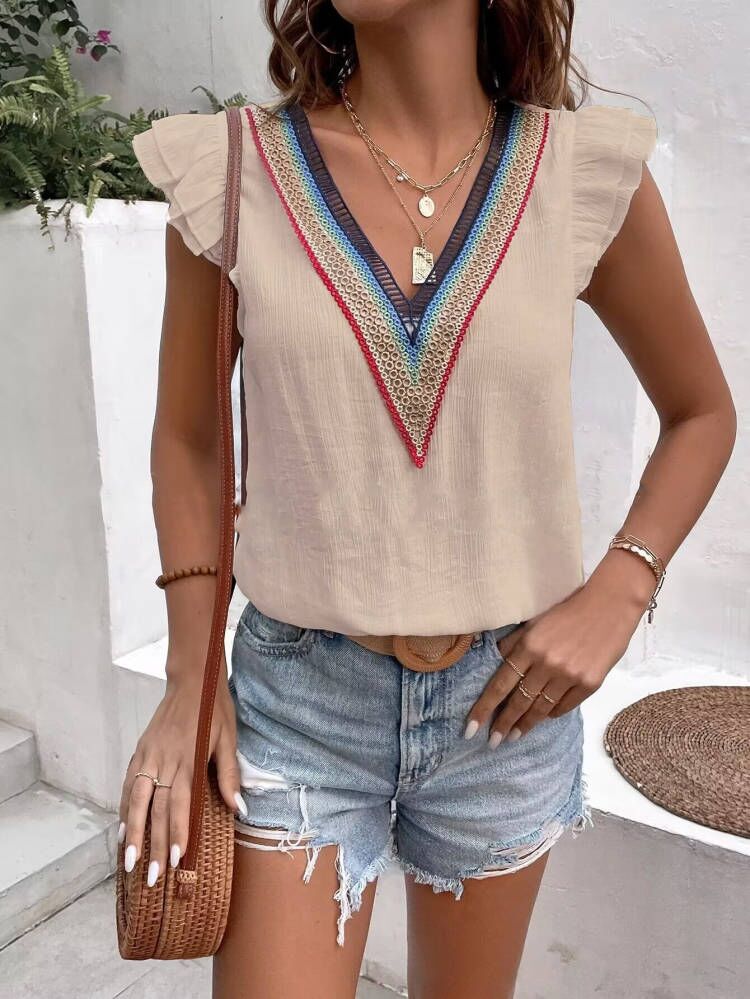 Chemisier brodé à col en V pour femmes avec des manches à volants Chic und Stil