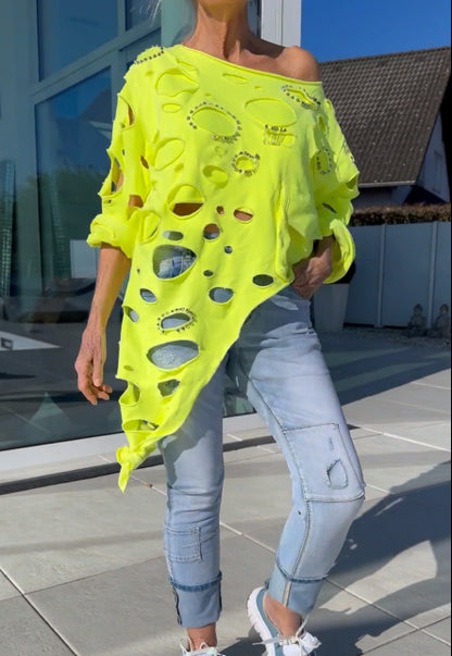 T-shirt oversized pour femmes avec des détails de déchirure tendance et une coupe décontractée Chic und Stil