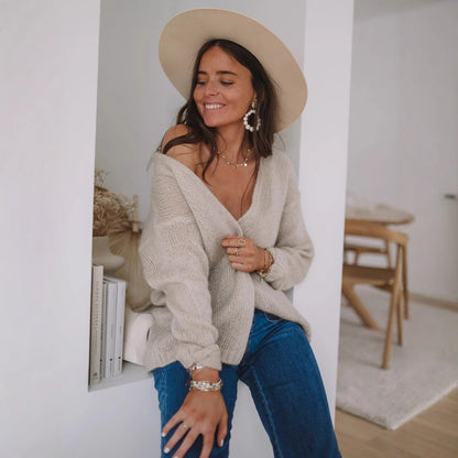 Pull léger pour femmes avec épaule dénudée et motif tricot doux Chic und Stil