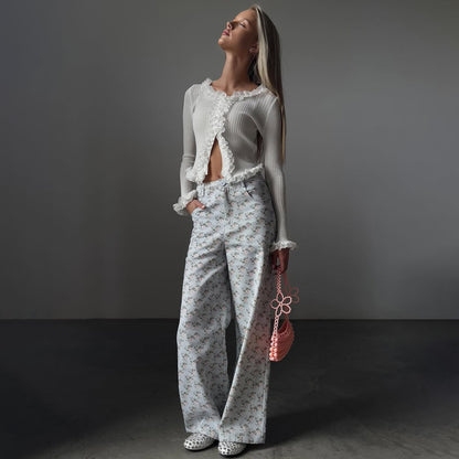 Ladies refined pullover with chic and stylish ruffle details