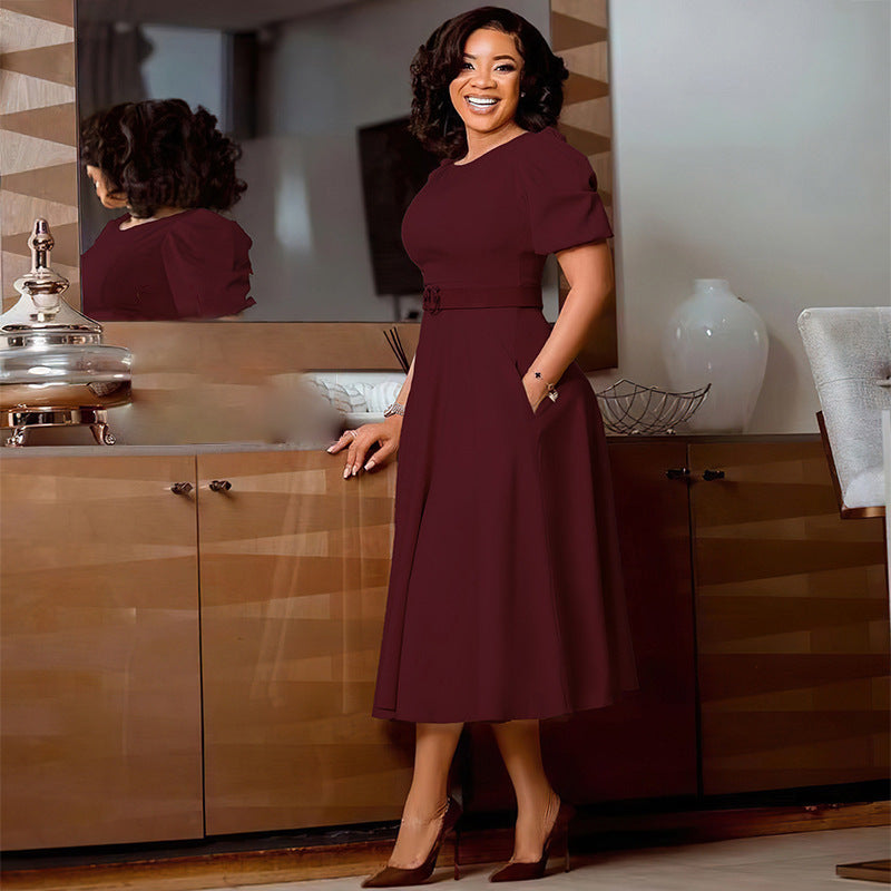 Robe midi pour femmes avec des manches bouffantes et une ceinture ajustée Chic und Stil