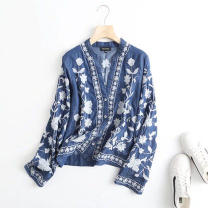 Blouse vintage brodée pour femmes avec col élégant et fermeture à boutons pression Chic und Stil