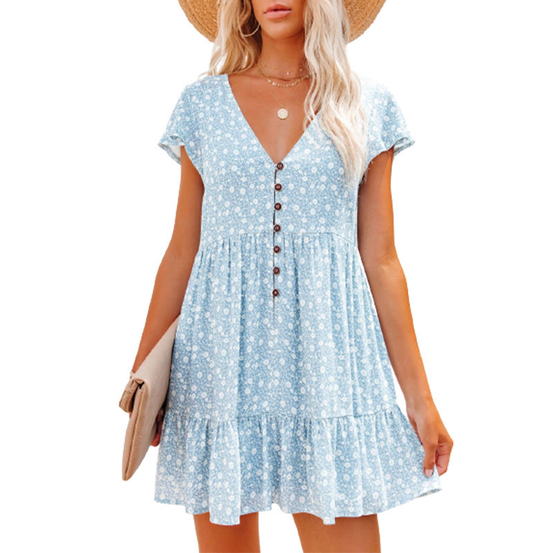 Robe d'été pour femmes avec des motifs floraux et des détails de boutons Chic und Stil