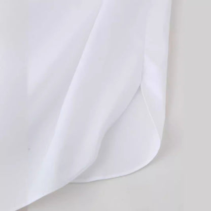 Blouse habilement conçue pour femmes avec des appliqués floraux Chic und Stil
