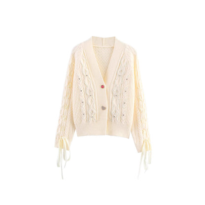 Dames cardigan avec détails scintillants et éléments de volants spéciaux Chic und Stil