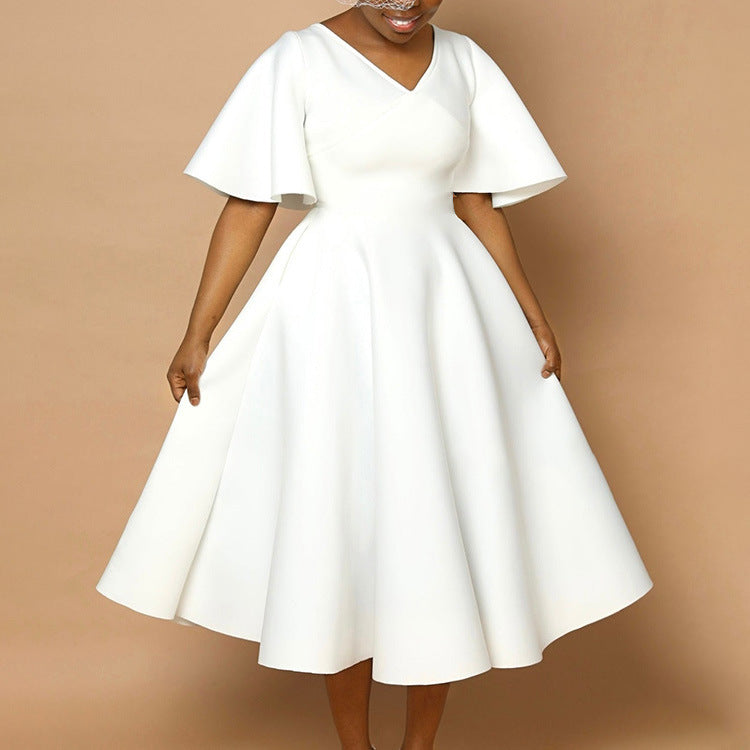 Robe portefeuille pour femmes avec une coupe fluide et des manches volumineuses Chic und Stil