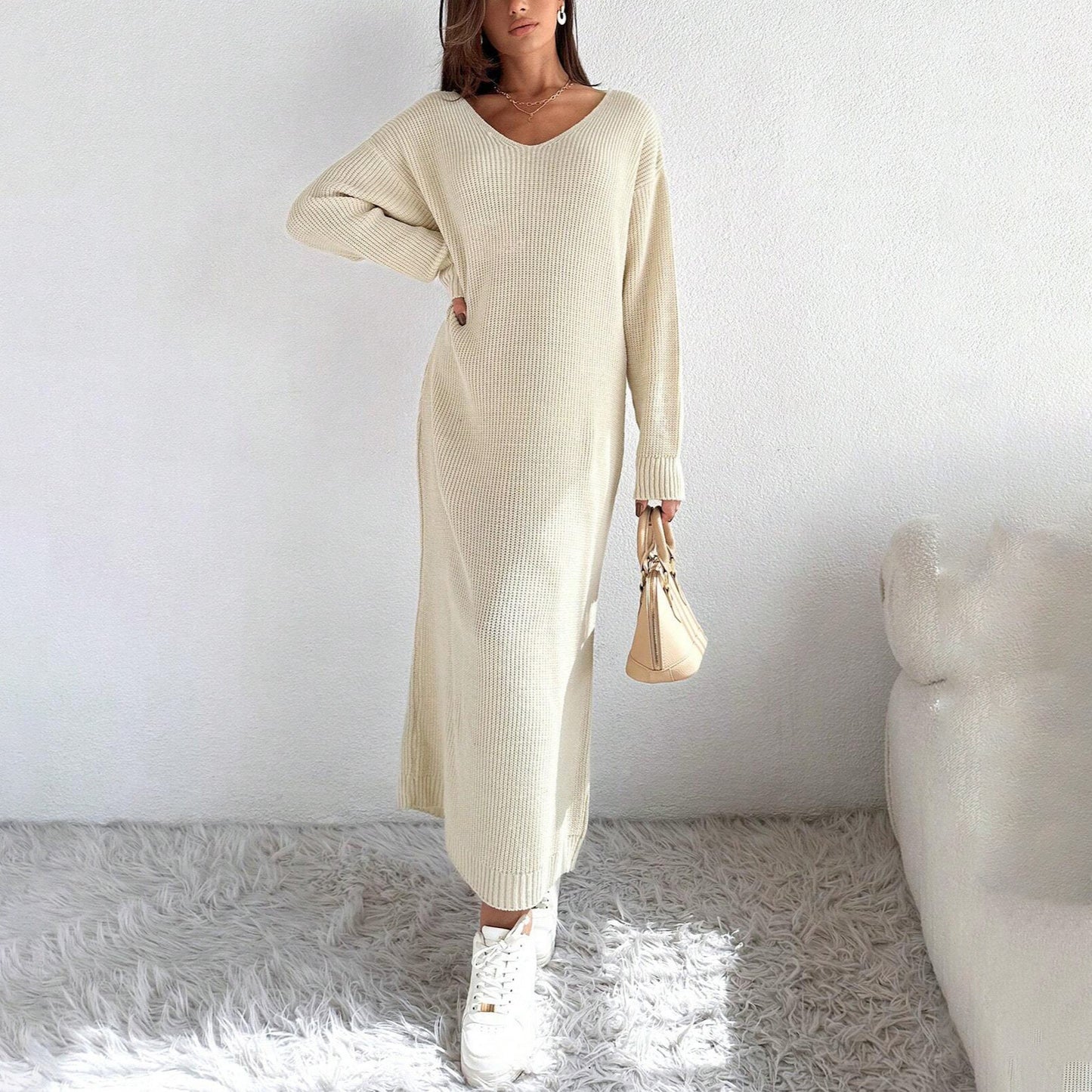 Robe en tricot décontractée pour femmes avec une coupe asymétrique et une ceinture élégante Chic und Stil