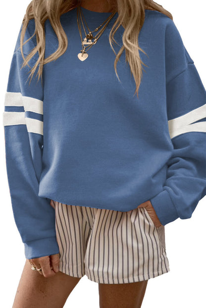 Pull oversized sportif pour femmes avec des accents rayés et une coupe décontractée Chic und Stil