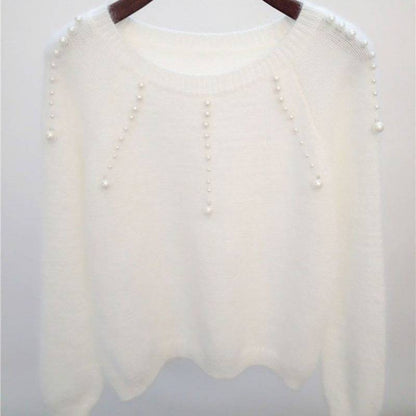 Pull femme élégant avec des accents de perles élégants Chic und Stil