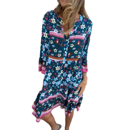 Robe de blouse décontractée pour femmes avec un motif floral coloré et une ourlet évasé au genou Chic und Stil
