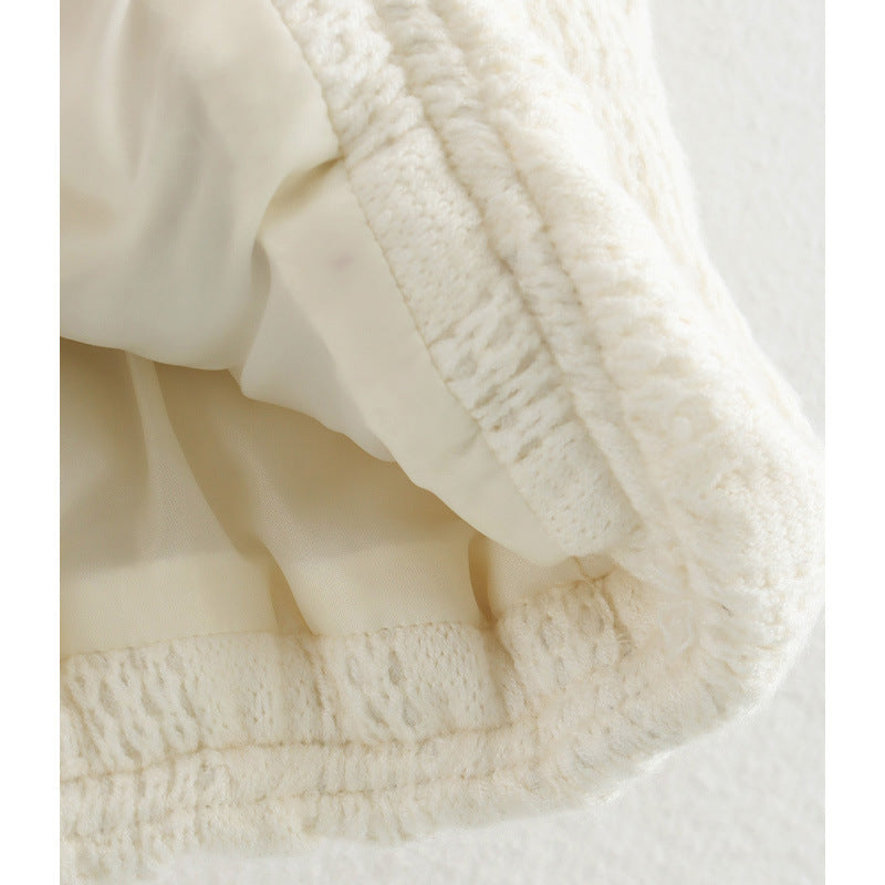 Dame gilet matelassé avec motif tricot de haute qualité et poches pratiques Chic und Stil