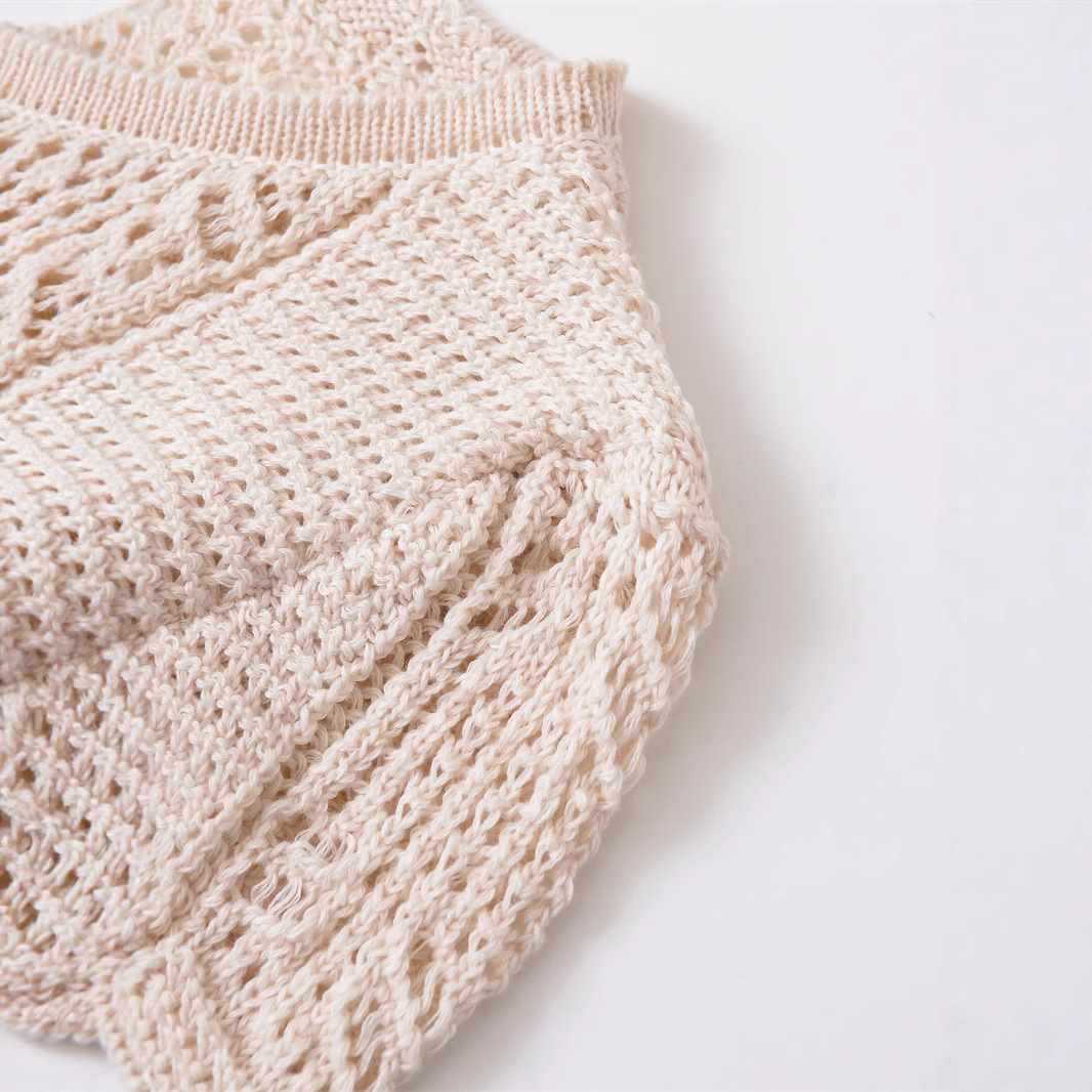 Dames cardigan en tricot confortable avec des boutons décoratifs et un design à volants tendance Chic und Stil