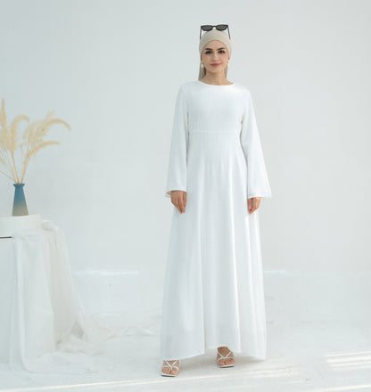 Robe maxi élégante pour dames avec des manches longues et des poches latérales Chic und Stil
