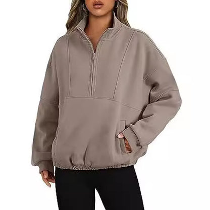 Oversized fleece pullover for women with a high collar and side pockets Chic und Stil