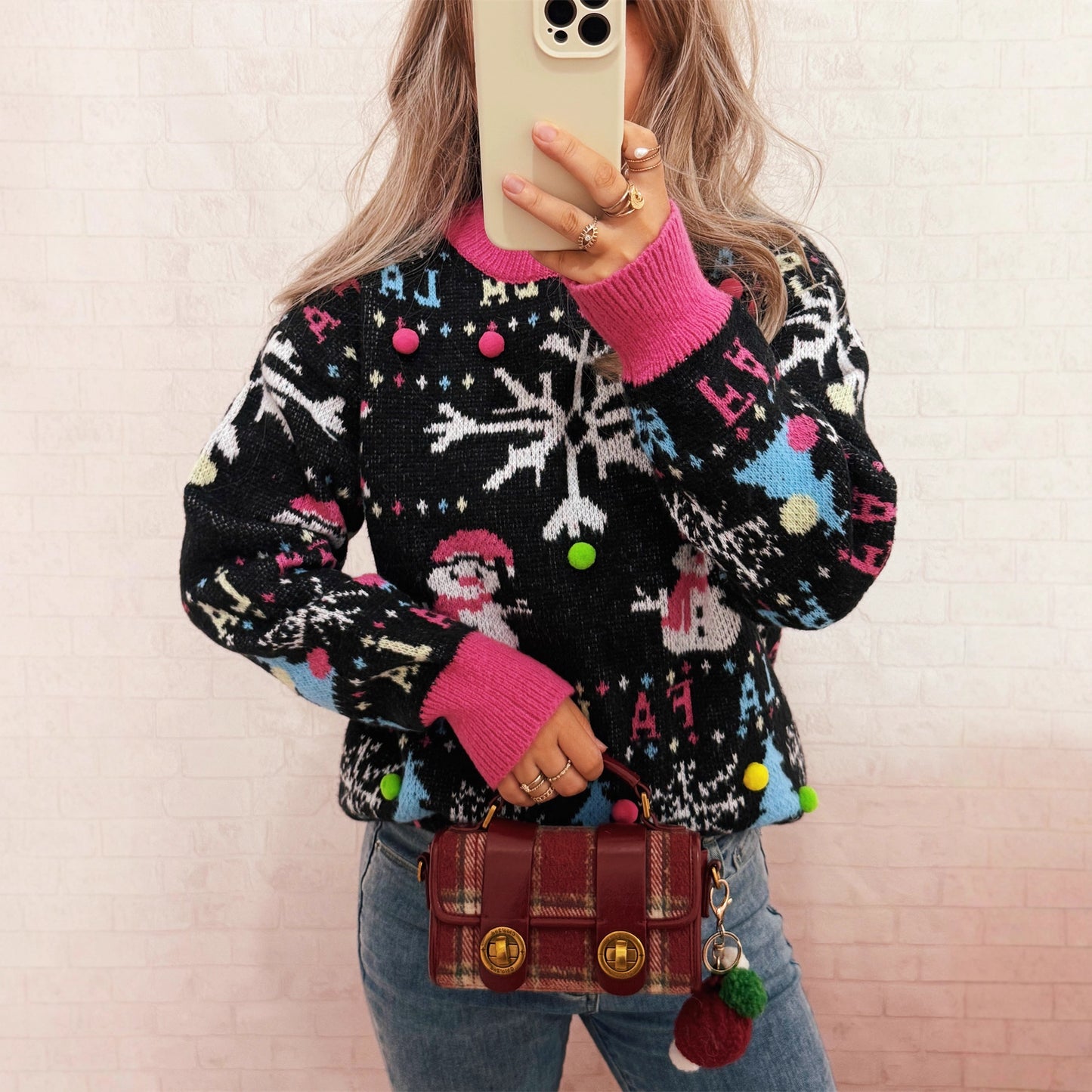 Pull élégant pour femmes avec des motifs de Noël colorés et des détails ludiques Chic und Stil