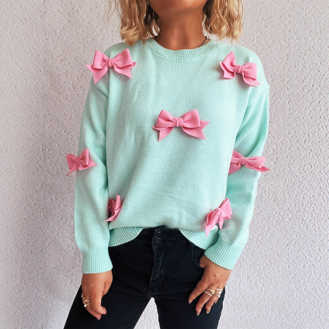 Pull femmes avec des applications de nœuds ludiques Chic und Stil