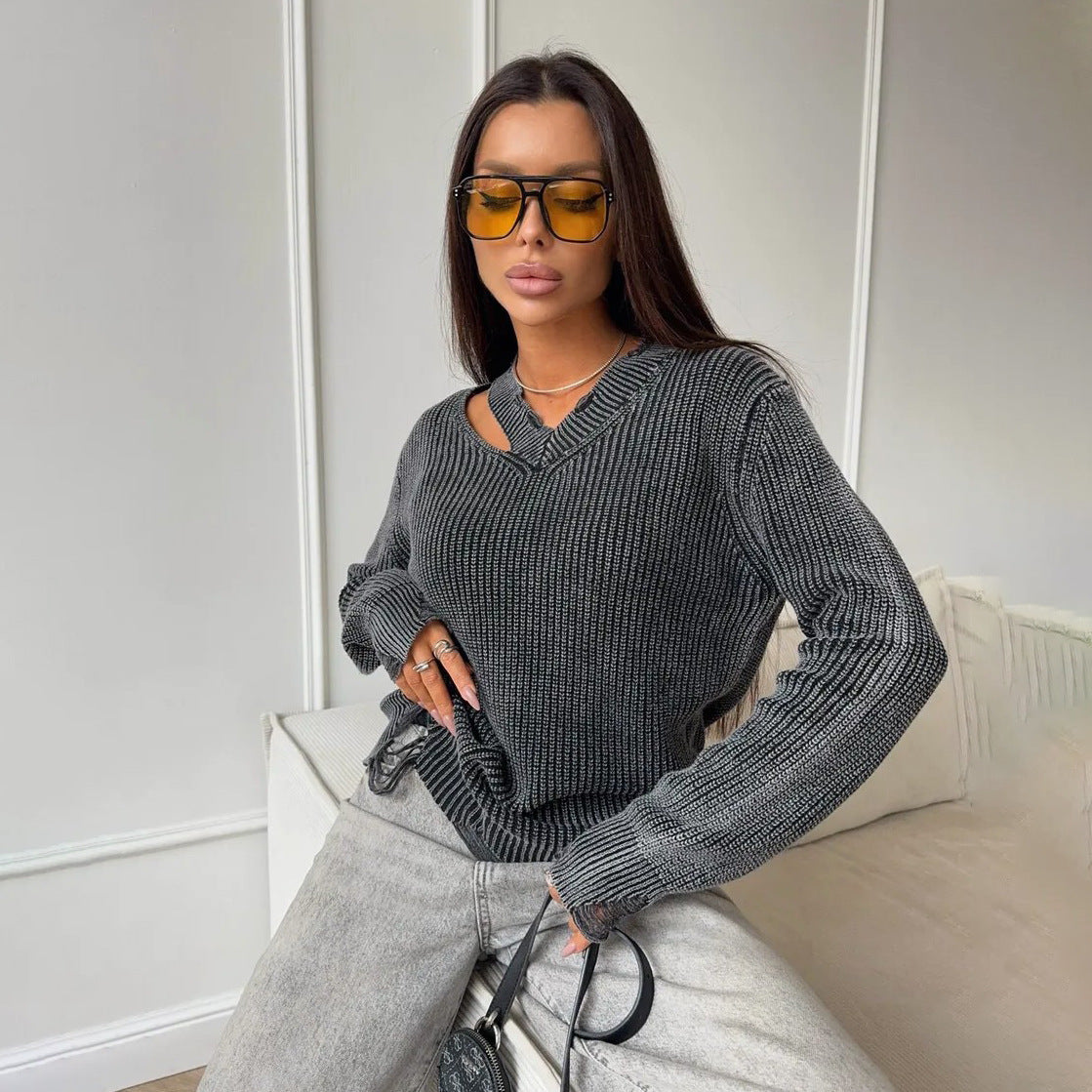 Pull en tricot épais pour femmes avec un décolleté en V tendance et des éléments usés Chic und Stil