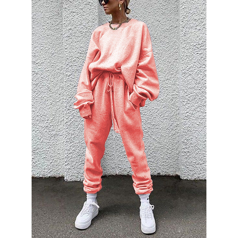 Women casual and comfortable leisure set with an oversized sweater and chic jogging pants and style