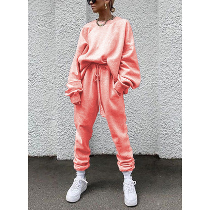 Women casual and comfortable leisure set with an oversized sweater and chic jogging pants and style