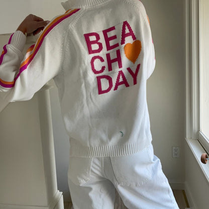 Pull à zip sportif pour femmes avec des rayures colorées Chic und Stil
