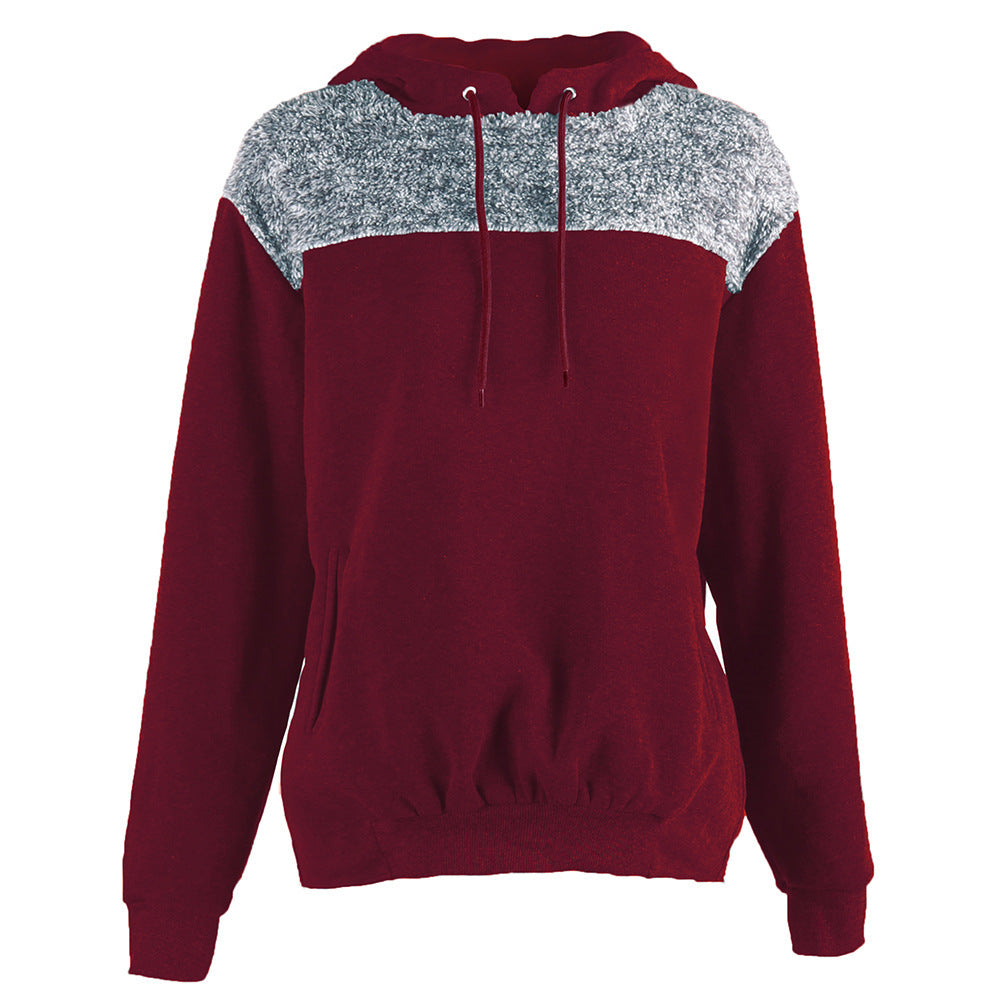 Pull à capuche pour femmes avec un design contrastant stylé et un ourlet élastique Chic und Stil