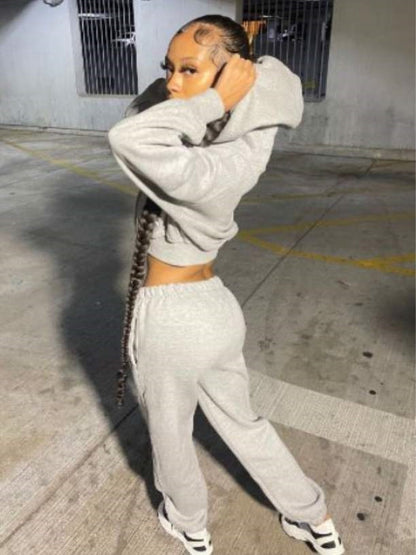 Women's sporty leisure sweatshirt set and jogging pants with a practical kangaroo pocket design Chic and Style