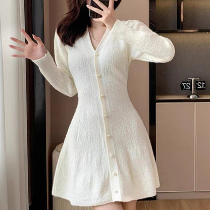 Robe en tricot pour femmes avec patte de boutonnage et manches de style ballet Chic und Stil