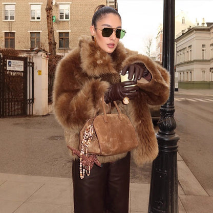 Faux fur jacket for women with a voluminous cut and elegant collar Chic and Style