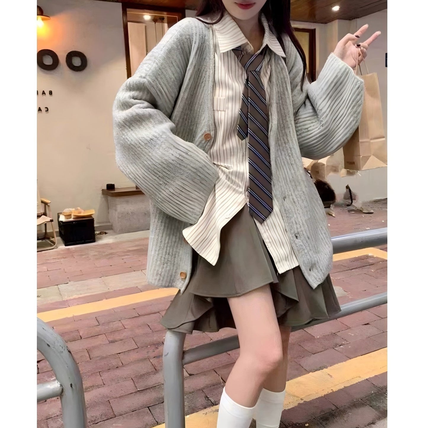 Women's comfortable knitted vest with button closure and chic, stylish V-neck