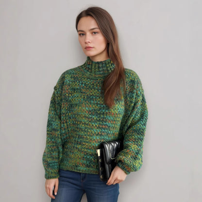 Pull de femme confortable à col roulé avec un design moderne en tricot ajouré Chic und Stil