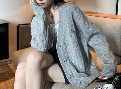 Cardigan pour femmes avec motif en câble et grands boutons Chic & Stil