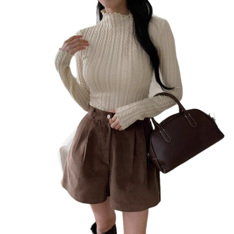 Dames haut à manches longues avec design texturé Chic und Stil