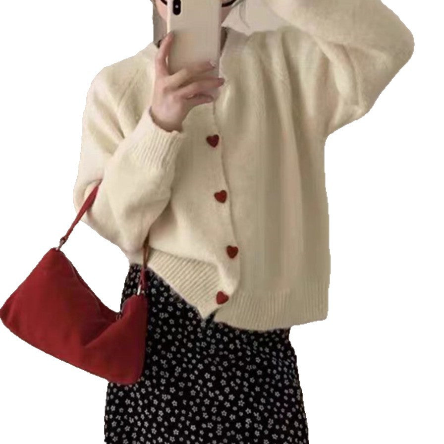 Dames pull-over tricot doux avec boutons en forme de cœur Chic und Stil