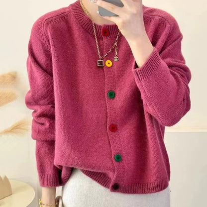 Women's playful knit vest with colorful button details Chic and Stil