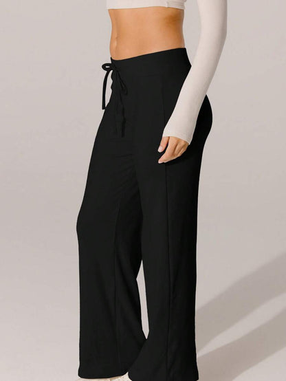 Chic and Style women's wide leisure pants with elastic waistband and tie belt